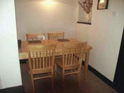 The dining area in the Three Horseshoes holiday apartment, Cricklade, Wiltshire